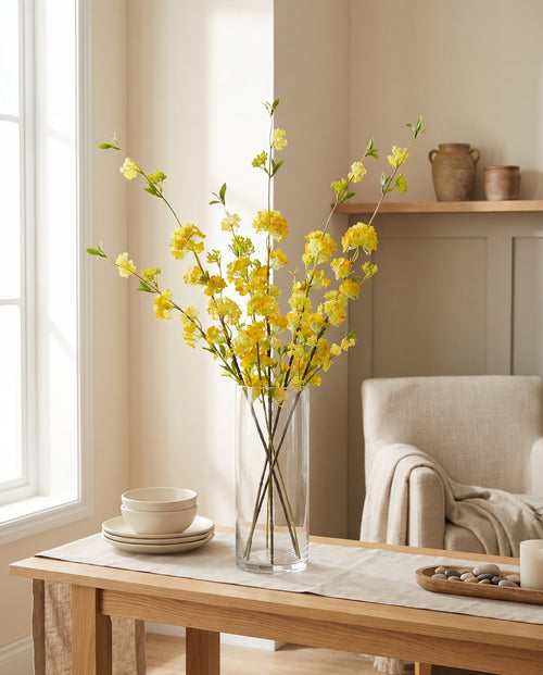 100cm Yellow Blossom Spray Stem styled in a room