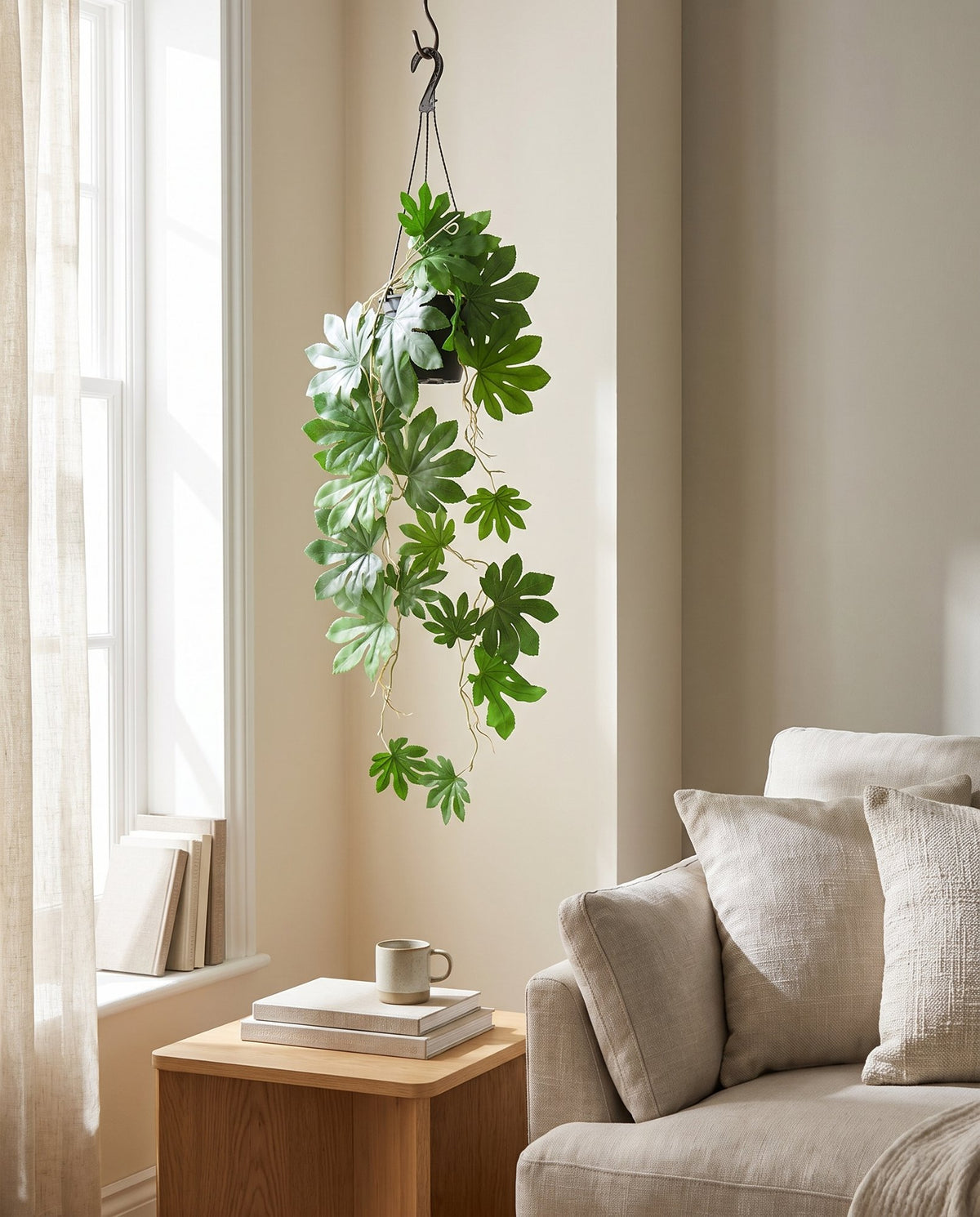 110cm Artificial Hanging Trailing Aralia Plant styled in a room
