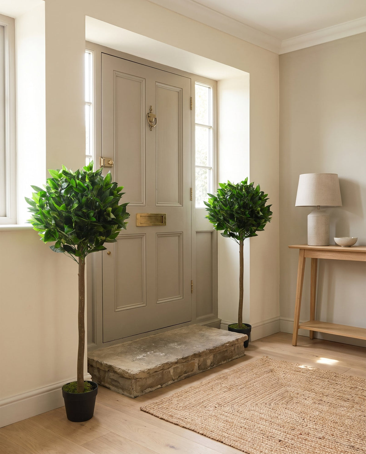 120cm UK Pair of Artificial Bay Topiary Ball Trees styled in a room