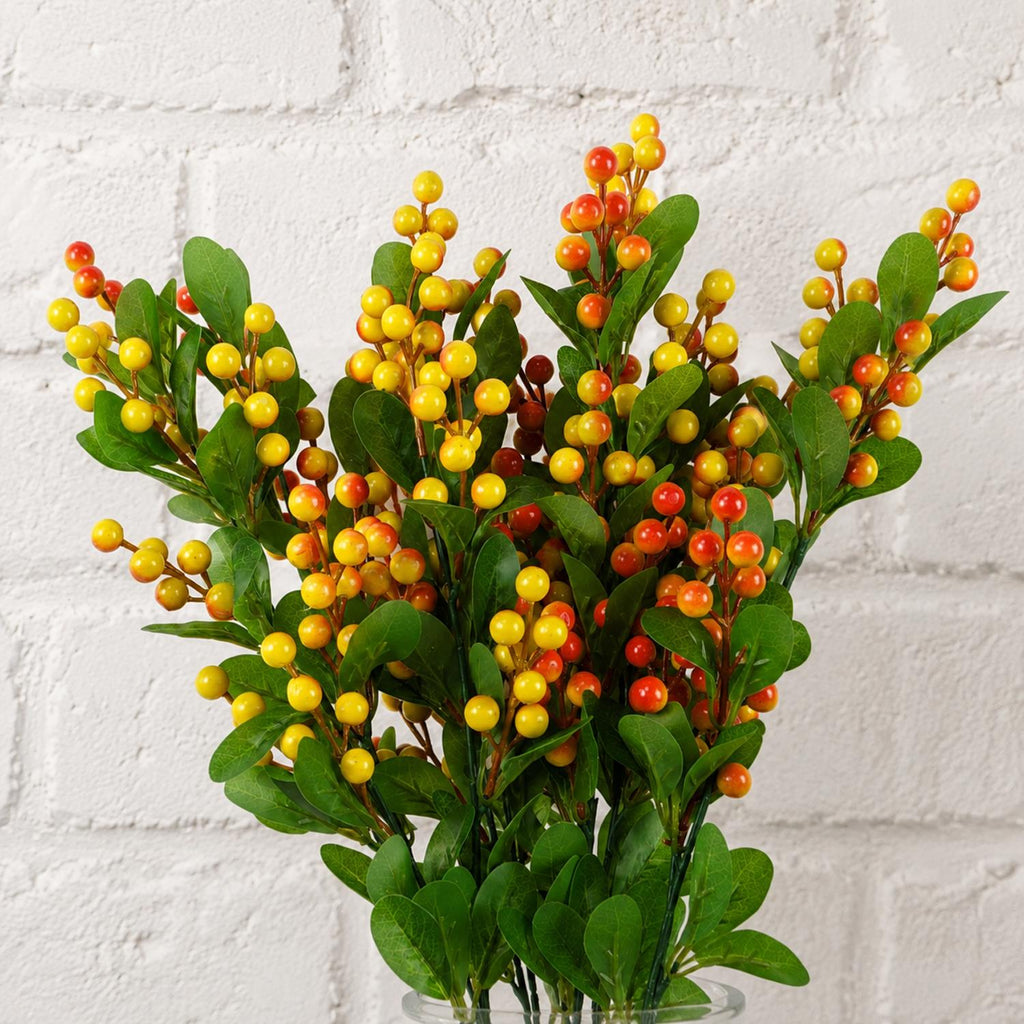 Pack of 6 x 70cm Artificial Orange Berry Spray styled in a room