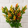 Pack of 6 x 70cm Artificial Orange Berry Spray styled in a room