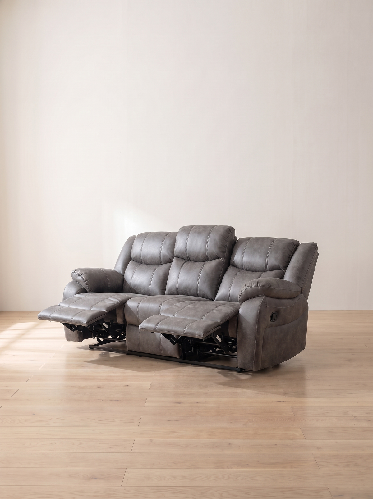 London Manual Recliner Sofa in grey – fully reclined with footrests raised